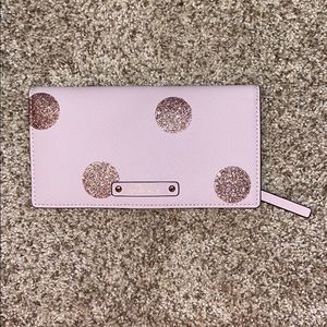 Kate spade wallet pink with sparkly circles.